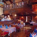 Cozy up with Celebrities at this Rustic Chalet Restaurant in St. Moritz