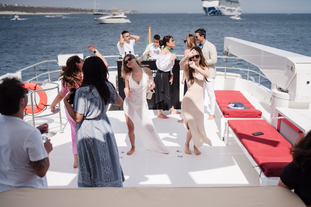 VIP guests dancing on Northern Dream yacht during Ocean Blue World event