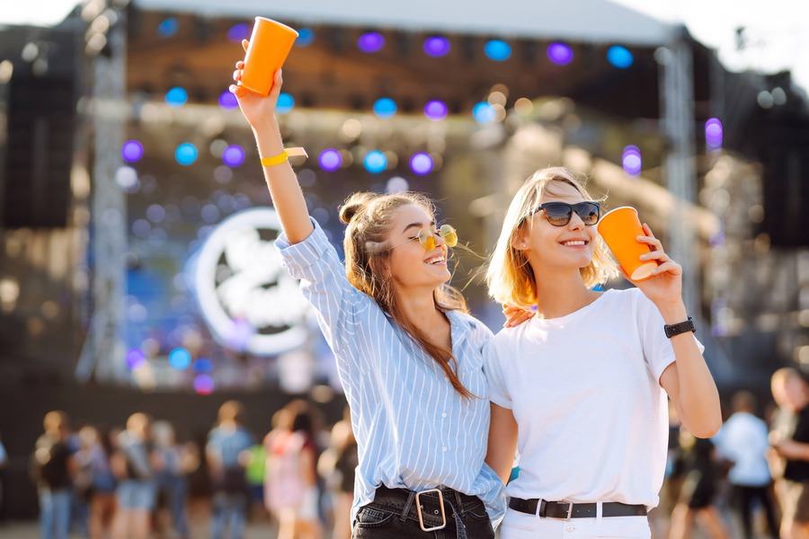 Two young woman at music festival
