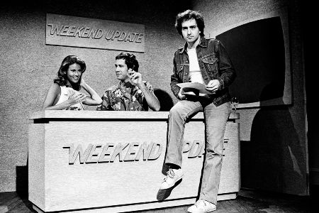 Lorne Michaels on set with Raquel Welch and Chevy Chase