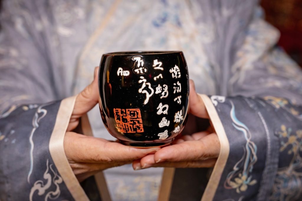 A traditional porcelain tea cup honoring the timeless ritual of Chinese hospitality